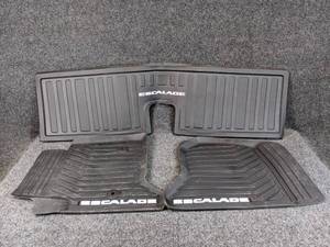lot 689 image: 2015-2020 Cadillac Escalade Genuine GM Floor Mats - Front and Rear - Part No. 23452752, Part No. 22823334