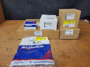 lot 398 image: NOS - Genuine GM & AC Delco Parts - Part No. 12595106, 10184916, 19121590, 15808595, 20820718 and 23135228