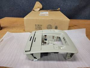 lot 403 image: NOS - GM 2018 Yukon  Tahoe  Suburban  Escalade Roof Console - Shale - Part No. 84435105