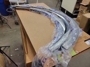 lot 419 image: NOS - Genuine Ford 2015 to 2018 F150 Stainless Steel Fender Trim Kit - Part No. VGL3Z-16268-A