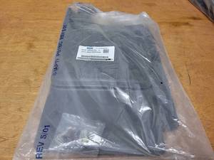 lot 461 image: NOS - Genuine Ford Front Mud Flap Kit - Fits 2017 to 2020 Ford Super Duty Trucks - Part No. HC3Z-16A550-EA