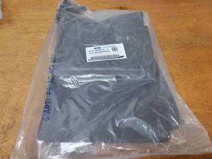 lot 462 image: NOS - Genuine Ford Front Mud Flap Kit - Fits 2017 to 2020 Ford Super Duty Trucks - Part No. HC3Z-16A550-EA