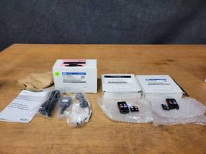 lot 486 image: Genuine Ford Remote Starter Kit and Transmitters - Open Boxes but all parts appear new - Part No. EL3Z-19G364-B and (2) 2W7Z-15K601-BA