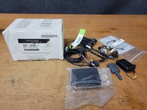 lot 499 image: Genuine Ford Plug & Play Remote Starter Kit- Series 200 - Part No. BB5Z-19G364-C  Open Box, parts present appear unused, no key FOB - Not sure if other parts are missing