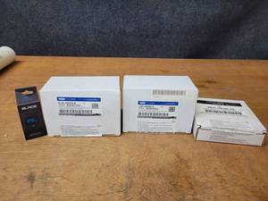 lot 503 image: NOS - Genuine Ford Remote Starters and Parts - EL3Z-19G364-B (Sealed), JJ5Z-19A361-A (Open Box) and 2W7Z-19G366-AA (Open Box)