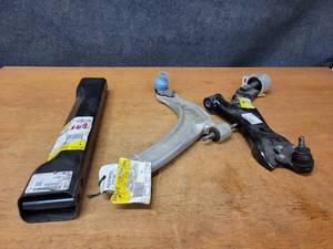 lot 557 image: NOS - Genuine GM Control Arms and Crossmember - Part No. 22833303, 15787556 and 25848407 - NO SHIPPING