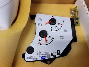 lot 653 image: NOS - Genuine Ford Fuel Gauge - Part No. 1L5Z-9280-AB