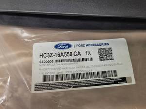 lot 454 image: NOS - Genuine Ford Front Mud Flap Kit - Fits 2017 to 2020 Ford Super Duty Trucks - Part No. HC3Z-16A550-CA
