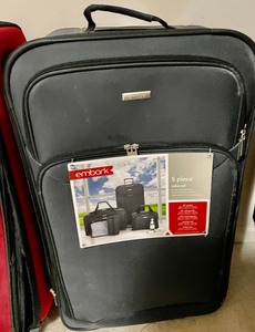 lot 73 image: 4 Rolling Suitcases