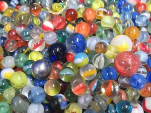 lot 18 image: CROWN BAG FULL OF VINTAGE MARBLES.