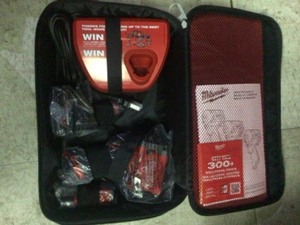 Milwaukee M12 FUEL 12-Volt Lithium-Ion Brushless Cordless Stubby 38 in. Impact Wrench Kit with One 4.0 and One 2.0Ah Batteries