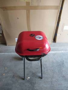 lot 56 image: Americana Walk-A-Bout Portable Charcoal Grill