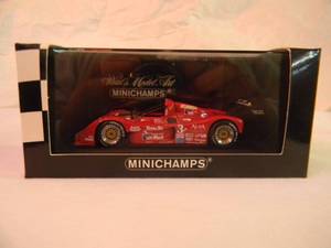 lot 44 image: MINICHAMPS PAULS MODEL ART 143 SCALE FERARRI 333SP WINNER 12H SEBRING 1997 - NEW IN BOX - AWESOME GREAT PIECE - SEE PICTURES