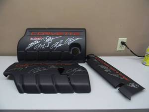 lot 1 image: SIGNED BY CORVETTE RACE DRIVERS - OEM LS-2 GM Corvette Engine Covers Fuel Rail - Left Right 12568998 12569246 - GM CORVETTE Cover Asm-Int Manif 12643709 - GREAT SET TO DISPLAY - SEE PICTURES
