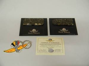 lot 40 image: LIMITED EDITION - INDIANAPOLIS MOTOR SPEEDWAY - OFFICIAL TRACK SURFACE DISPLAYS WITH KEYCHAIN - GREAT PIECES - SEE PICTURES