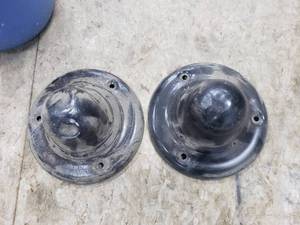 lot 43 image: Antique Truck Hub Caps & Fence Insulators