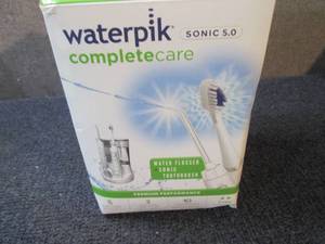lot 113 image: Waterpik Complete Oral Care 5.0 - W...