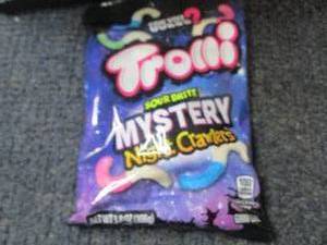 lot 164 image: Case of 11- 3.8 oz Bags Trolli Sour...