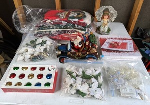 lot 576 image: Christmas Decor Lot Ornaments, Stockings, Kitchen Decor, Snowflake Ceramic Platter, and More