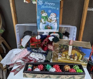 lot 554 image: Christmas Decor Lot Christmas Wrapping Paper Kit, Nativity Set, & More