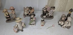 lot 496 image: Collection of 7 Enesco NBM Bahner Studios Figurines