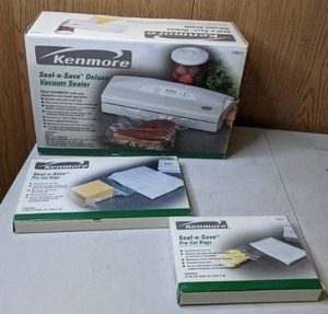 lot 510 image: Kenmore Seal-n-Save Deluxe Vacuum Sealer with Two Boxes of Seal-n-Save Bags