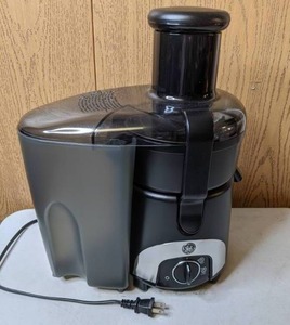 lot 403 image: GE Juice Extractor