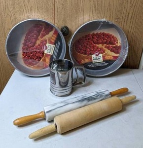 lot 407 image: Baking Essentials Rolling Pins (2), Flour Sifter, Round Spring Form Pans (2)