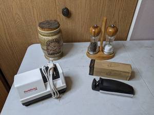 lot 420 image: Kitchen Items - MN Wild Rice Canister, Salt & Pepper Shakers, Chefs Choice Knife Sharpener, Pampered Chef Cutlery Honing Tool
