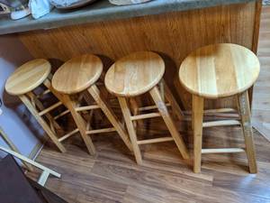 lot 524 image: Lot of Four Light Oak Colored Barstools (24.5 tall)