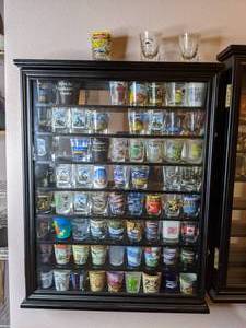 lot 526 image: Pair of Shadowboxes with Souvenir Shotglass Collection