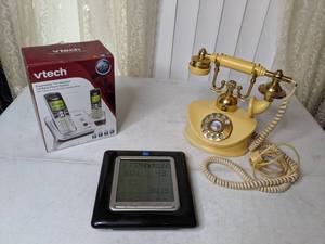 lot 527 image: Lot of VTech Cordless Phone System, Weather Channel Alarm Clock and an Antique Rotary Princess Style Phone