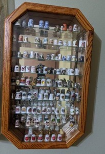 lot 240 image: Collectible Thimble and Glass Display Case