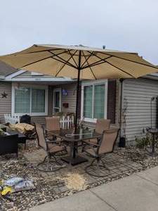 lot 26 image: Outdoor Patio Furniture  Table, 4 Chairs and Umbrella