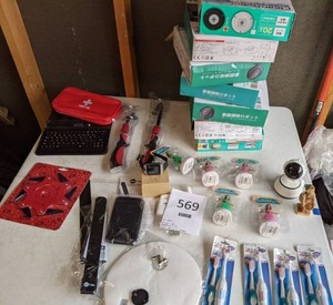 lot 569 image: Mixed Lot CleanRobot Vacuums, Electric Toothbrushes, Solar Hula Girls, Tablet Cover w Keyboard, & More