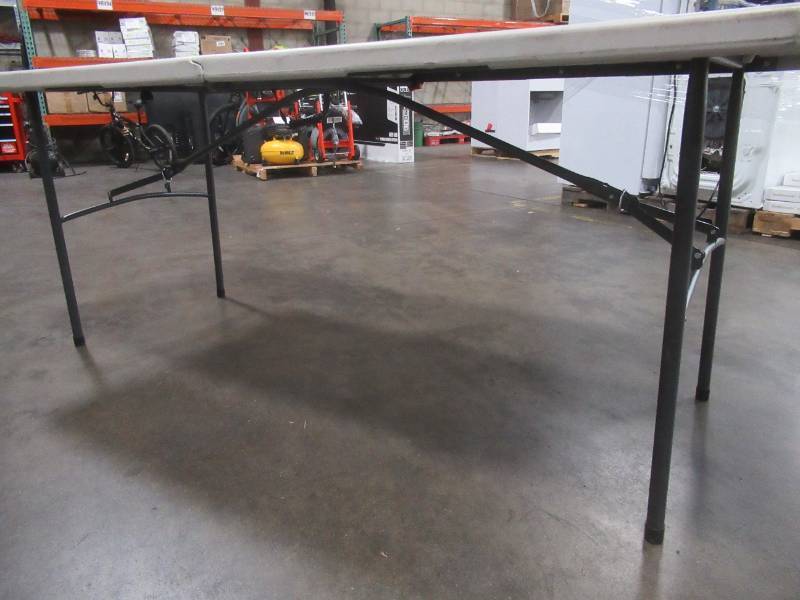 lot 304 image: HDX 6 ft. Earth Tan Folding Resin Table, TA3072FX03 - Scratched.
