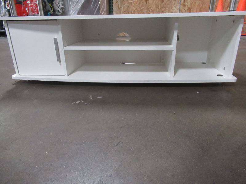lot 318 image: Monterey 47 in. White Composite TV Stand Fits TVs Up to 46 in. R5-211 - Missing Storage Door and Back Center Post. Scratch and Dent.