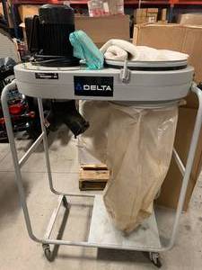 lot 24 image: Delta 50- 760 1 12hp 1200 CFM Dust Bay Collector with Extra Bag