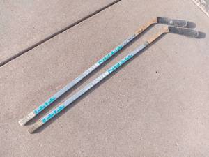 2 Titan Hockey Sticks