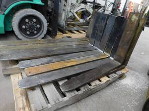 lot 26 image: Pallet of Mismatched Class II Forklift Forks
