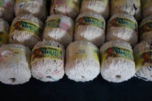 lot 12 image: Thirty- Eight Skeins Of Patons Cotton Splash Yarn--Light Cream Colored