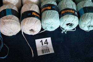 lot 14 image: Twelve Skeins Of Nevada Bolivia Yarn--Cream -- Light Green -- Medium Blue