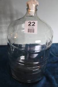 lot 22 image: Vintage Clear Glass Gallon Jug