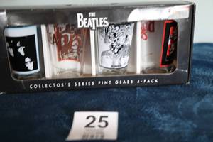 lot 25 image: Collectors Series Pint Glass--4 Pack    The Beatles