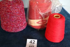 lot 42 image: Three Skeins Of Yarn--Magicolor--(Miscellaneous Reds)