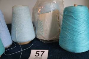 lot 57 image: Five Skeins Of Blues Yarn