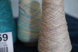 lot 59 image: Four Skeins Of Yarn In Miscellaneous Colors