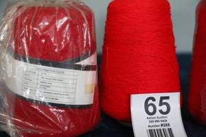 lot 65 image: Yeoman Poodle Skeins Of Red Yarn