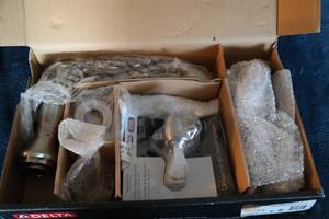 lot 127 image: Delta Universal Shower Faucets
