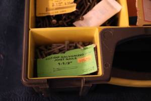 lot 147 image: Container With Compartments & Lid Filled With Galvanized Nails, Etc.